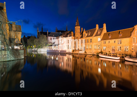 BRUGES, Belgium - Sometimes called 'The Venice of the North,' the historic Flemish city of Bruges has canals running through the old town. Before the water access became silted up, Bruges was a major commercial port. Medieval architecture and serene canals shape the cityscape of Bruges, often referred to as 'The Venice of the North'. As a UNESCO World Heritage city, Bruges offers visitors a journey into Europe's past, with its well-preserved buildings and cobblestone streets reflecting the city's rich history. Stock Photo