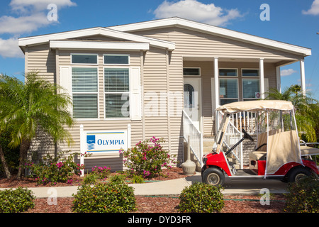 Florida Port Charlotte,Vizcaya Lakes,prefab,prefabricated,home,homes,new,sale,model,golf cart,Olympia,visitors travel traveling tour tourist tourism l Stock Photo