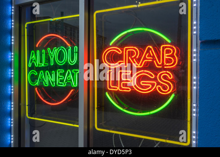 Orlando Florida,International Drive,neon sign,all you can eat,restaurant restaurants food dining cafe cafes,buffet style,crab legs,ad,advertising,FL14 Stock Photo