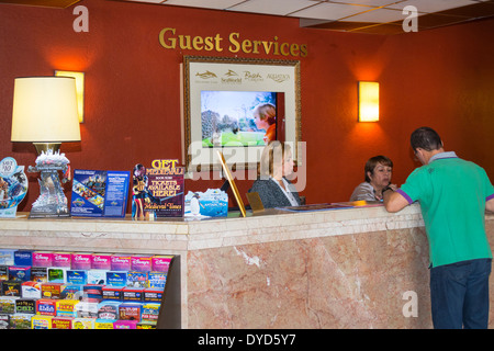 Orlando Florida,Allure Resort International Drive,hotel hotels lodging inn motel motels,lobby,guest services,desk,service,adult adults woman women fem Stock Photo
