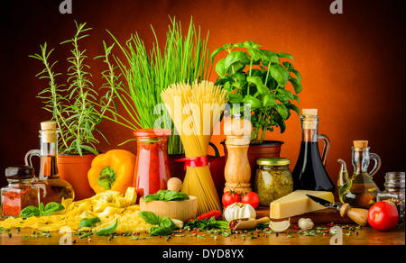 still life with traditional italian pasta ingredients, herbs and spices Stock Photo