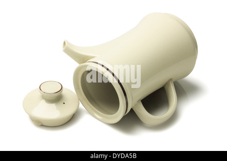 Open Porcelain Tea Pot Lying on White Background Stock Photo