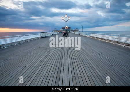 Cromer Pier at dusk on the north Norfolk coast. Stock Photo