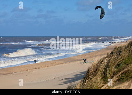 Kite surfing at Sea Palling on the Norfolk coast. Stock Photo