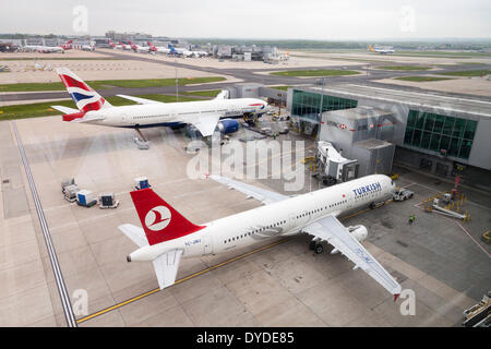 British Airways and Turkish Airways aeroplanes at Gatwick Airport. Stock Photo