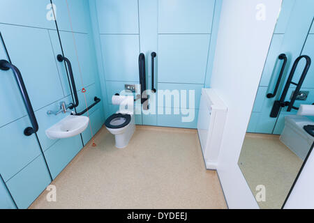 Disabled toilet room with grab rails. Stock Photo