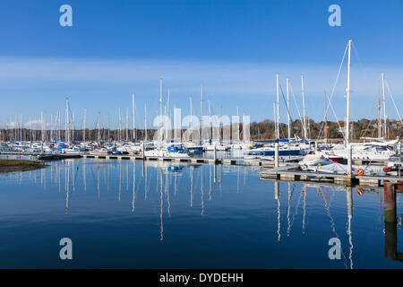 Moored yachts on a River Hamble marina at Lower Swanwick on a crisp winter sunny day. Stock Photo