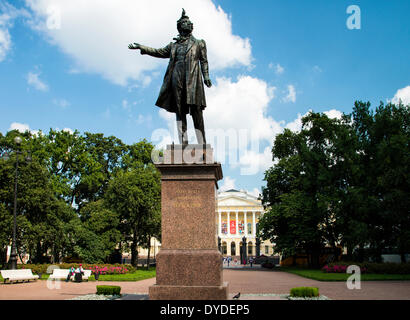 A monument to Alexander Pushkin on the Arts Square with the Mikhailovsky Palace in the background. Stock Photo