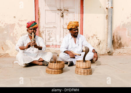 Snake charmers outside the Jaipur City Palace and museum. Stock Photo