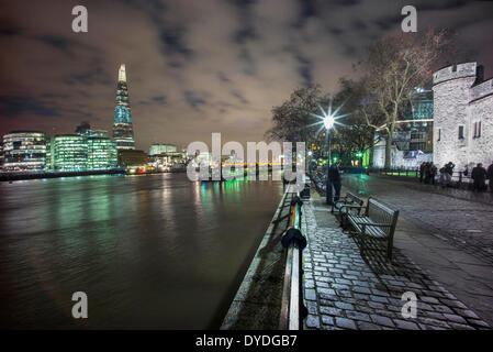 The Tower of London with The Shard and The River Thames at dusk. Stock Photo