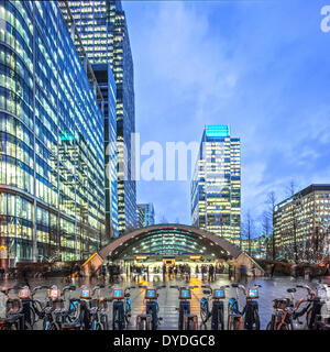 Canary Wharf tube station and Boris bikes. Stock Photo