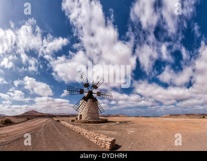 Spain, Europe, Fuerteventura, Canary Islands, Tefia, Molino de Tefia, windmill, summer, hills, clouds, desert, Stock Photo