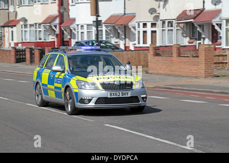A Metropolitan Police ANPR (Automatic number plate recognition) car with flashing lights in Hanwell, London, UK. Stock Photo