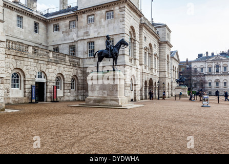 Household Cavalry Museum and bronze equestrian statue of Field Marshal Garnet Joseph on Horse guards Parade, London, UK Stock Photo