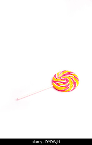 Yellow and pink lollipop on a white background Stock Photo