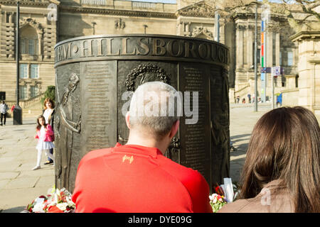 Anfield, Liverpool, UK. 15th April, 2014. Liverpool fans pay tribute to the Hillsborough Memorial in the city centre on the 25th anniversary of the death of 96 fans at Hillsborough. Stock Photo