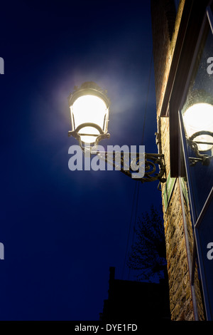 In Bruges you find this antique street lamps hanging longest wall Stock Photo