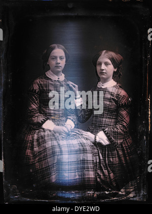 Two Teen Girls in Identical Plaid Dresses, Portrait, Daguerreotype, Circa 1850's Stock Photo