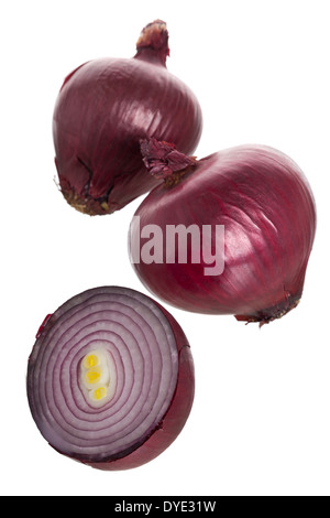 Whole and cut red onions isolated on white background Stock Photo - Alamy