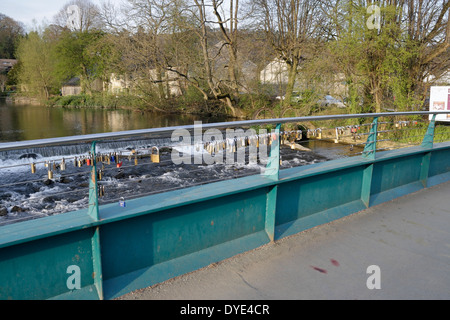 Love Locks on weir bridge a footbridge over the river Wye in Bakewell England Stock Photo