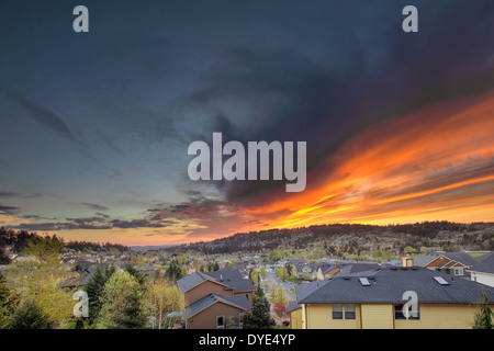 Fiery Sunset Over Suburb Residential Homes in Happy Valley Oregon Stock Photo