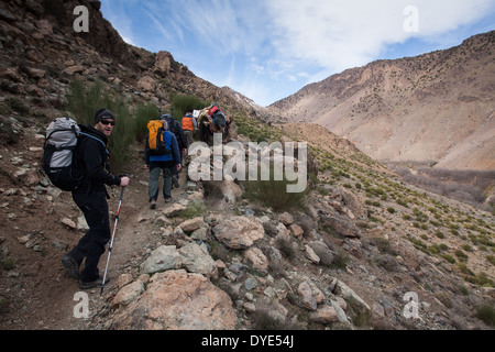 Trekkers in the Atlas Mountains Stock Photo