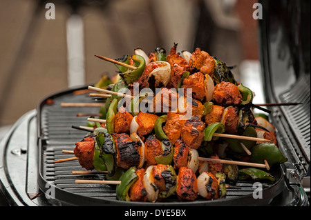 A stack of Kabobs on a grill are just waiting for hungry patrons to enjoy them. They were for sale during a festival in Ms. Stock Photo