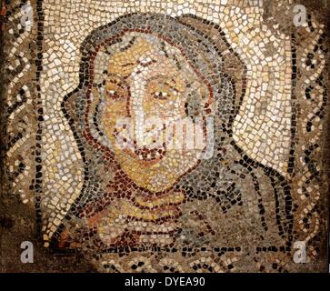 Ancient Roman mosaic with the representing an old Woman. Barcelona, Spain 2013 Stock Photo