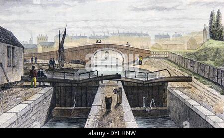Double pound lock on the Regent's Canal, London,  showing the east end of the Islington Tunnel in the background. Hand-coloured engraving, London, c1839. Stock Photo
