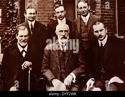Photograph of Sigmund Freud, Carl Jung and Sándor Ferenczi along with other members of the growing world of psychoanalysis, in front of Clark University. Taken in 1909. Carl Jung was Swiss, and lived 26 July 1875–6 June 1961. Sigmund Freud was Austrian, and lived between 6 May 1856-September 1939. Sándor Ferenczi was Hungarian, and lived between 7 July 1873–22 May 1933. All were involved in the founding stages of psychoanalysis. The three other members of the group are American psychoanalyst G. Stanley Hall, Austrian/American Abraham Brill and British/Welsh psychoanalyst Ernest Jones. Stock Photo