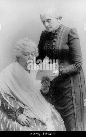 Elizabeth Cady Stanton, seated, and Susan B. Anthony, standing, three-quarter length portrait.  Between 1880 and 1902. Stock Photo