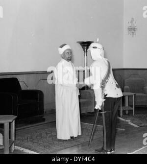 24th anniversary of Arab revolt under King Hussein & Lawrence 1940. The Emir being congratulated by Glubb Pasha. Stock Photo