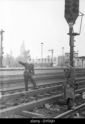 Two police officers stand on the tracks at Zoo Railway Station in Berlin, Germany, 1949. Until 1949, the entire Berlin Railway Company was subordinate to the German Reihnsbahn (national railway) part of the Soviet Zone. On 21 May 1949, the independent union opposition UGO called for a railway strike in western sectors. About 13,000 railway employees living in West Berlin wint on strike for wages in Western Deutschmarks. Photo: zbarchiv - NO WIRE SERVICE Stock Photo