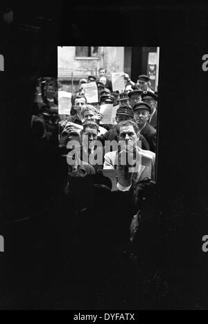 Workers of the East German State Railway during the ballot vote about the continuation of the strike in West Berlin, photograph taken on 02 June 1949. The whole railway operations and infrastructure of Berlin were subordinated to the East German State Railway (Deutsche Reichsbahn, DR) of the Soviet zone of occupation until 1949. On 21 May 1949, the Unabhängige Gewerkschaftsopposition UGO in the West sectors called upon to strike. Around 13.000 Reichsbahner (workers of the East German State Railway) living in West Berlin stopped work and fought for a payment in Westmark. Photo: zbarchiv - BLOCK Stock Photo