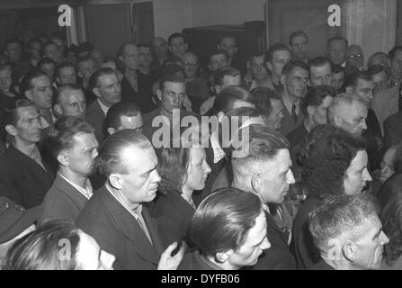 Workers of the East German State Railway during the ballot vote about the continuation of the strike om West Berlin, photograph taken on 02 June 1949. The whole railway operations and infrastructure of Berlin were subordinated to the East German State Railway (Deutsche Reichsbahn, DR) of the Soviet zone of occupation until 1949. On 21 May 1949, the Unabhängige Gewerkschaftsopposition UGO in the West sectors called upon to strike. Around 13.000 Reichsbahner (workers of the East German State Railway) living in West Berlin stopped work and fought for a payment in Westmark. Photo: zbarchiv - BLOCK Stock Photo