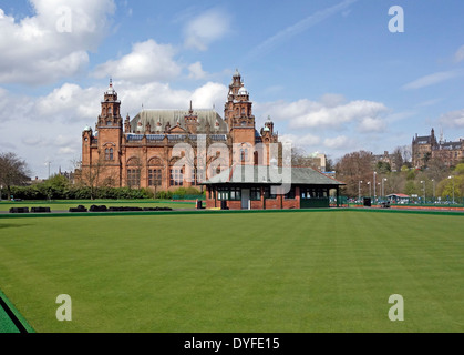 View from the west of Kelvingrove Art Gallery & Museum in the west end of Glasgow Scotland with bowling green and house front Stock Photo