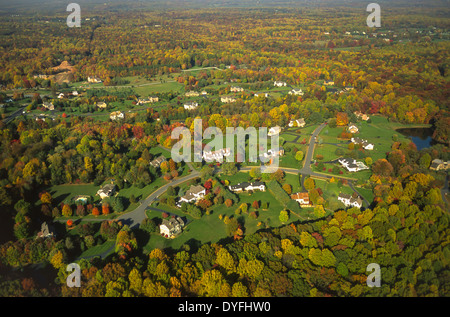 LOUDOUN COUNTY, VIRGINIA, USA - aerial of suburban housing development with autumn foliage. Stock Photo