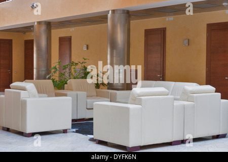 interior with beige sofas and armchairs Stock Photo - Alamy