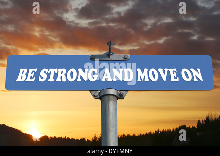 Be strong and move on road sign Stock Photo - Alamy