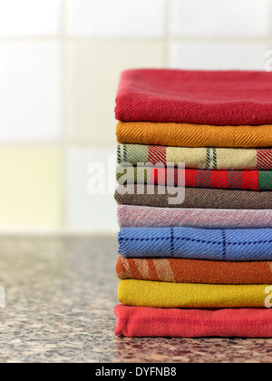 Colorful stack of kitchen towels Stock Photo
