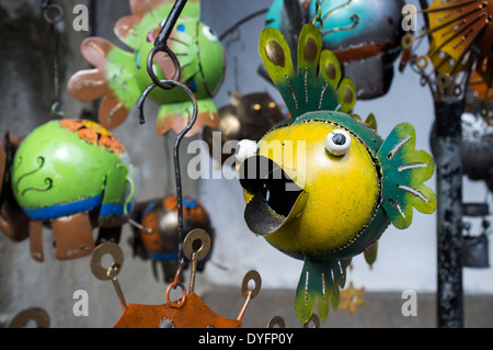 Souvenirs (metal fish) for sale at the market in Ubud, Bali, Indonesia Stock Photo