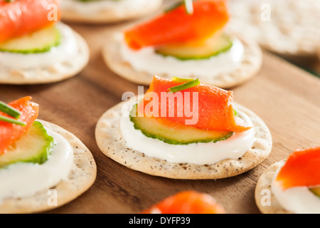Salmon and Cracker Hor D'oeuvres with Chives and Sour Cream Stock Photo