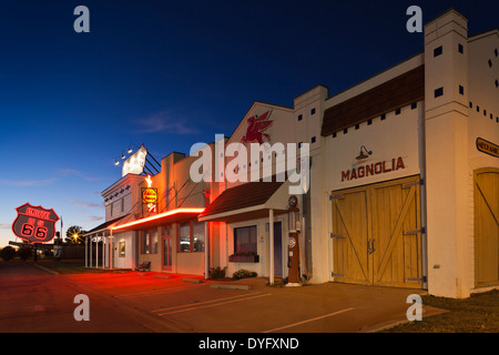 USA, Oklahoma, Elk City, National Route 66 Museum, buildings at dusk Stock Photo