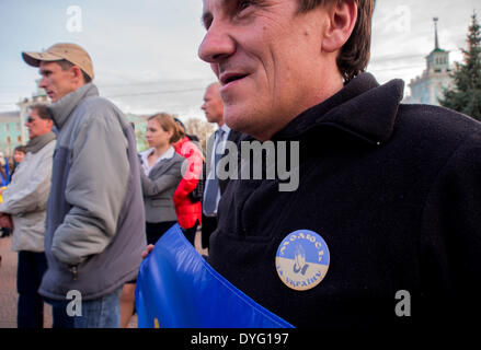 Luhansk, Ukraine. 17th April, 2014. Ukrainian patriot with a badge that says 'Pray for Ukraine' during the rally 'For United Ukraine' Credit:  Igor Golovnov/Alamy Live News Stock Photo