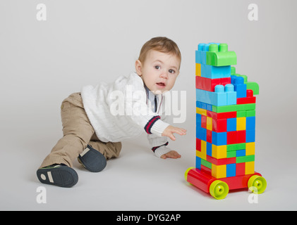 boy plays the plastic designer Stock Photo