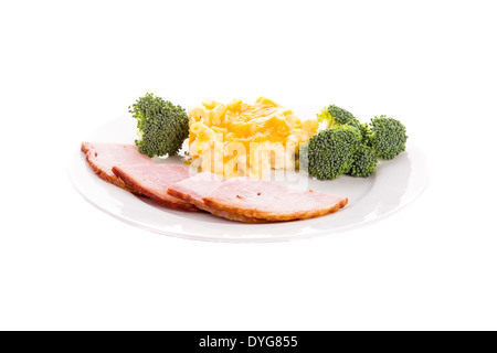 A white plate of sliced ham, macaroni and cheese, and broccoli isolated on white Stock Photo