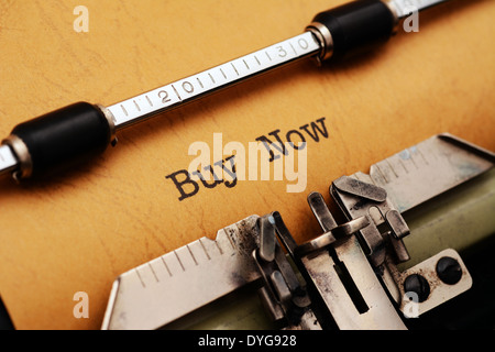 Buy now text on typewriter Stock Photo
