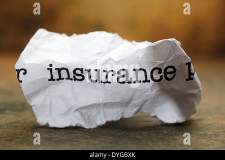 Insurance text on paper Stock Photo