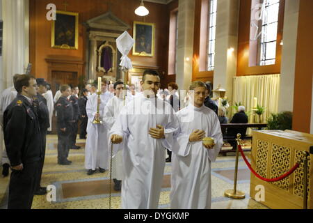 Dublin, Ireland. 17th April 2014. The altar servers process into St. Mary's Pro-Cathedral. Dublin's Roman Catholic Archbishop Diarmuid Martin led the Chrism Mass in Dublin's St. Mary's Pro-Cathedral. The mass, that takes traditional place on Holy Thursday, sees the Holy Oils being blessed for the coming year. It was attended by clergy from all parishes in the diocese. Credit:  Michael Debets/Alamy Live News Stock Photo