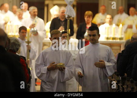 Dublin, Ireland. 17th April 2014. The altar servers process out of St. Mary's Pro-Cathedral. Dublin's Roman Catholic Archbishop Diarmuid Martin led the Chrism Mass in Dublin's St. Mary's Pro-Cathedral. The mass, that takes traditional place on Holy Thursday, sees the Holy Oils being blessed for the coming year. It was attended by clergy from all parishes in the diocese. Credit:  Michael Debets/Alamy Live News Stock Photo